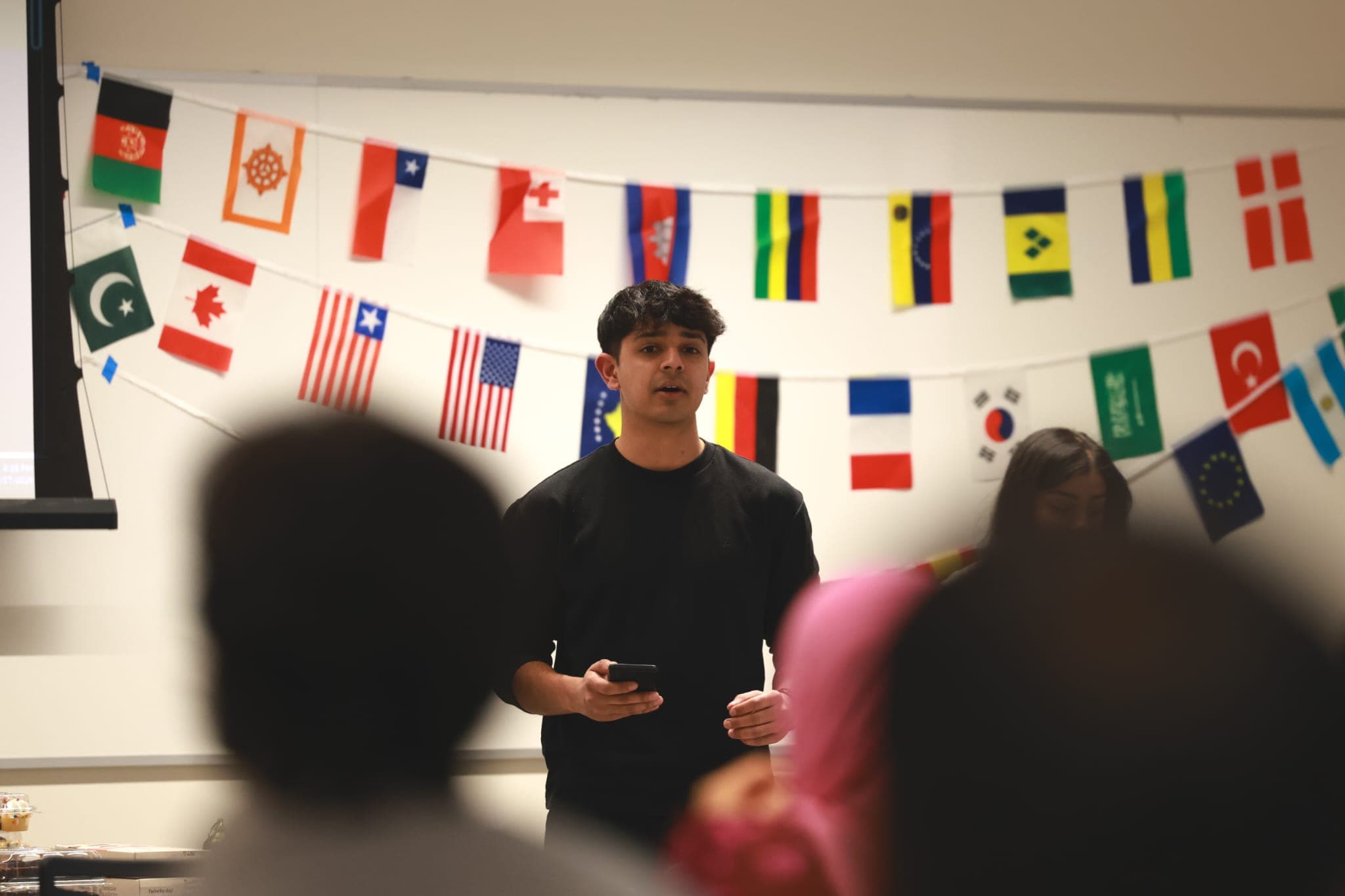 VisaViz founder speaking with international students